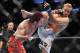 PORTLAND, OR - AUGUST 29: UFC fighter Chris Leben (L) battles UFC fighter Jake Rosholt (R) during their Middleweight bout at UFC 102: Couture vs. Nogueira at the Rose Garden Arena on August 29, 2009 in Portland, Oregon. (Photo by Jon Kopaloff/Getty Images)