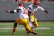 EAST RUTHERFORD, NJ - SEPTEMBER 08: Dion Bailey #18 of the USC Trojans is congratulated by teammateT.J. McDonald #7 after Bailey makes an interception during a game against the Syracuse Orange at MetLife Stadium on September 8, 2012 in East Rutherford, New Jersey. (Photo by Rich Schultz /Getty Images)