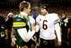 GREEN BAY, WI - JANUARY 02: Quarterback Aaron Rodgers #12 of the Green Bay Packers is congratukated by quarterback Jay Cutler #6 of the Chicago Bears at Lambeau Field on January 2, 2011 in Green Bay, Wisconsin. (Photo by Matthew Stockman/Getty Images)