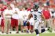 GLENDALE, AZ - SEPTEMBER 09: Quarterback Russell Wilson #3 of the Seattle Seahawks scrambles with the football against the Arizona Cardinals during the season opener at the University of Phoenix Stadium on September 9, 2012 in Glendale, Arizona. The Carindals defeated the Seahawks 20-16. (Photo by Christian Petersen/Getty Images)