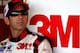 RICHMOND, VA - SEPTEMBER 07: Greg Biffle, driver of the #16 3M/Owens & Minor Ford, looks on from in the garage during practice for the NASCAR Sprint Cup Series Federated Auto Parts 400 at Richmond International Raceway on September 7, 2012 in Richmond, Virginia. (Photo by Jerry Markland/Getty Images for NASCAR)