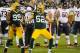 Sept 13, 2012; Green Bay, WI, USA; Green Bay Packers linebacker Clay Matthews (52) celebrates with defensive tackle Jerel Worthy (99) after a sack during the game against the Chicago Bears at Lambeau Field. Mandatory Credit: Benny Sieu-US PRESSWIRE