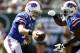 EAST RUTHERFORD, NJ - SEPTEMBER 09: Ryan Fitzpatrick #14 hands off to C.J. Spiller #28 of the Buffalo Bills during their season opener at MetLife Stadium on September 9, 2012 in East Rutherford, New Jersey. (Photo by Jeff Zelevansky/Getty Images)