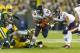 Sep 13, 2012; Green Bay, WI, USA; Chicago Bears running back Michael Bush (29) rushes with the football during the third quarter against the Green Bay Packers at Lambeau Field. Mandatory Credit: Jeff Hanisch-US PRESSWIRE