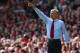 LIVERPOOL, ENGLAND - SEPTEMBER 02: Arsene Wenger the manager of Arsenal gives his players instructions during the Barclays Premier League match between Liverpool and Arsenal at Anfield on September 2, 2012 in Liverpool, England. (Photo by Alex Livesey/Getty Images)