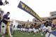 PITTSBURGH, PA - SEPTEMBER 01: The West Virginia Mountaineers run onto the field before taking on the Marshall Thundering Herd on September 1, 2012 at Mountaineer Field in Morgantown, West Virginia. (Photo by Justin K. Aller/Getty Images)
