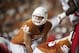 AUSTIN, TX - SEPTEMBER 8: David Ash #14 of the Texas Longhorns calls a play at the line of scrimmage against the University of New Mexico Lobos on September 8, 2012 at Darrell K Royal-Texas Memorial Stadium in Austin, Texas. (Photo by Cooper Neill/Getty Images)