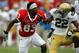 Sept 3, 2011; Houston, TX, USA; Houston Cougars wide receiver Patrick Edwards (83) and UCLA Bruins cornerback Sheldon Price (22) get up after a fight during the first quarter at Robertson Stadium. Mandatory Credit: Thomas Campbell-US PRESSWIRE