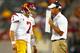 EAST RUTHERFORD, NJ - SEPTEMBER 08: Head coach Lane Kiffin of the USC Trojans talks to quarterback Matt Barkley #7 during a game against the Syracuse Orange at MetLife Stadium on September 8, 2012 in East Rutherford, New Jersey. (Photo by Rich Schultz/Getty Images)