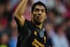 SUNDERLAND, ENGLAND - SEPTEMBER 15: Liverpool striker Luis Suarez celebrates the first Liverpool goal during the Barclays Premier league match between Sunderland and Liverpool at Stadium of Light on September 15, 2012 in Sunderland, England. (Photo by Stu Forster/Getty Images)