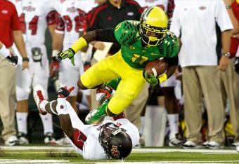 Addison running through an ASU defender