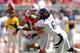 COLUMBUS, OH - SEPTEMBER 15: Chris Harper #6 of the California Golden Bears stretches to catch a tipped pass in the second half as John Simon #54 of the Ohio State Buckeyes moves in to defend at Ohio Stadium on September 15, 2012 in Columbus, Ohio. (Photo by Jamie Sabau/Getty Images)