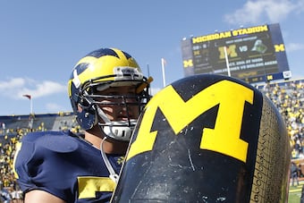 Taylor Lewan deserves a refreshing drink after scoring his first collegiate TD