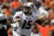 Sep 15, 2012; Auburn, AL, USA; Louisiana Monroe Warhawks quarterback Kolton Browning (15) drops back to pass against the Auburn Tigers in the first half at Jordan-Hare Stadium. Mandatory Credit: John Reed-US PRESSWIRE