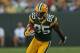 GREEN BAY, WI - AUGUST 30: Greg Jennings #85 of the Green Bay Packers runs after a catch against the Kansas City Chiefs during a preseason game at Lambeau Field on August 30, 2012 in Green Bay, Wisconsin. The Packers defeated the Chiefs 24-3. (Photo by Jonathan Daniel/Getty Images)