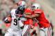 COLUMBUS, OH - SEPTEMBER 15: Ryan Shazier #10 of the Ohio State Buckeyes reaches to haul down C.J. Anderson #9 of the California Golden Bears after a large gain at Ohio Stadium on September 15, 2012 in Columbus, Ohio. Ohio State defeated California 35-28. (Photo by Jamie Sabau/Getty Images)
