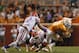 KNOXVILLE, TN - SEPTEMBER 15: Justin Hunter # 11 of the Tennessee Volunteers is tackled by Jonathan Bostic #1 and and Antonio Morrison #12 of the Florida Gators during the second half of play at Neyland Stadium on September 15, 2012 in Knoxville, Tennessee. (Photo by John Sommers II/Getty Images)