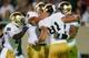 EAST LANSING, MI - SEPTEMBER 15: John Goodman #81 of the Notre Dame Fighting Irish celebrates his first quarter touchdown with teammates while playing the Michigan State Spartans at Spartan Stadium Stadium on September 15, 2012 in East Lansing, Michigan. (Photo by Gregory Shamus/Getty Images)