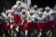 *The Lake Travis football team runs onto the field at the start of the game against Westwood at Reeves Athletic Complex.