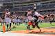 CINCINNATI, OH - SEPTEMBER 16: Trent Richardson #33 of the Cleveland Browns flips into the endzone at the end of a 32-yard touchdown run in the first half against the Cincinnati Bengals at Paul Brown Stadium on September 16, 2012 in Cincinnati, Ohio. (Photo by Jamie Sabau/Getty Images)