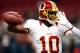 ST LOUIS, MO - SEPTEMBER 16: Quarterback Robert Griffin III #10 of the Washington Redskins warms up prior to the start of the game against the St. Louis Rams at Edward Jones Dome on September 16, 2012 in St Louis, Missouri. (Photo by Jamie Squire/Getty Images)