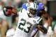 EAST RUTHERFORD, NJ - SEPTEMBER 9: Shonn Greene #23 of the New York Jets looks for a hole to run through against the Buffalo Bills during the season opener at MetLife Stadium on September 9, 2012 in East Rutherford, New Jersey. The Jets defeated the Billd 48-28. (Photo by Rich Schultz /Getty Images)