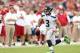 GLENDALE, AZ - SEPTEMBER 09: Quarterback Russell Wilson #3 of the Seattle Seahawks scrambles with the football against the Arizona Cardinals during the season opener at the University of Phoenix Stadium on September 9, 2012 in Glendale, Arizona. The Carindals defeated the Seahawks 20-16. (Photo by Christian Petersen/Getty Images)