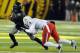 EUGENE, OR - NOVEMBER 26: Quarterback Darron Thomas #1 of the Oregon Ducks tries to avoid the cornerback Mike Turner #2 of the Arizona Wildcats in the third quarter of the game at Autzen Stadium on November 26, 2010 in Eugene, Oregon. The Ducks won the game 48-29. (Photo by Steve Dykes/Getty Images)