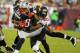 TAMPA, FL - AUGUST 24: Defensive back Ronde Barber #20 of the Tampa Bay Buccaneers #20 tackles tight end Aaron Hernendez #81 of the New England Patriots at Raymond James Stadium in a pre-season game August 24, 2012 in Tampa, Florida. (Photo by Al Messerschmidt/Getty Images)
