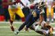 ST. LOUIS, MO - SEPTEMBER 16: Danny Amendola #16 of the St. Louis Rams avoided a tackle attempt by DeAngelo Hall #23 of the Washington Redskins at the Edward Jones Dome on September 16, 2012 in St. Louis, Missouri. (Photo by Dilip Vishwanat/Getty Images)