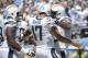 SAN DIEGO, CA - SEPTEMBER 16: Quarterback Philip Rivers #17 congratulates Wide Receiver Malcom Floyd #80 of the San Diego Chargers after receiving a touchdown against the Tennessee Titans on September 16, 2012 at Qualcomm Stadium in San Diego, California. (Photo by Donald Miralle/Getty Images)