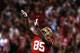 SAN FRANCISCO, CA - SEPTEMBER 16: Vernon Davis #85 of the San Francisco 49ers shoots the football like a basketball through the goal posts after he scored a touchdown in the fourth period against the Detroit Lions at Candlestick Park on September 16, 2012 in San Francisco, California. (Photo by Ezra Shaw/Getty Images)