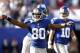 EAST RUTHERFORD, NJ - SEPTEMBER 16: Victor Cruz #80 of the New York Giants celebrates a touchdown against the Tampa Bay Buccaneers during a game at MetLife Stadium on September 16, 2012 in East Rutherford, New Jersey. (Photo by Jeff Zelevansky/Getty Images)