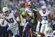 SEATTLE, WA - SEPTEMBER 16: Marshawn Lynch #24, center, of the Seattle Seahawks rushes the ball as Danny McCray #40, left, of the Dallas Cowboys and teammate Morris Claiborne #24 chase during play at CenturyLink Field on September 16, 2012 in Seattle, Washington. (Photo by Stephen Brashear/Getty Images)