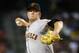 PHOENIX, AZ - SEPTEMBER 14: Starting pitcher Matt Cain #18 of the San Francisco Giants delivers a pitch against the Arizona Diamondbacks during the first inning of a MLB game at Chase Field on September 14, 2012 in Phoenix, Arizona. (Photo by Ralph Freso/Getty Images)