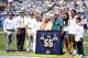 September 16, 2012; San Diego, CA, USA; Members of the Seau family and Chargers executives pose for a picture after a jersey retirement ceremony prior to the game between the San Diego Chargers and the Tennessee Titans at Qualcomm Stadium. Mandatory Credit: Christopher Hanewinckel-US PRESSWIRE