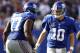 EAST RUTHERFORD, NJ - SEPTEMBER 16: Eli Manning #10 and Kevin Boothe #77 of the New York Giants celebrate a touchdown against the Tampa Bay Buccaneers during a game at MetLife Stadium on September 16, 2012 in East Rutherford, New Jersey. (Photo by Jeff Zelevansky/Getty Images)