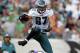 PHILADELPHIA, PA - SEPTEMBER 16: Tight end Brent Celek #87 of the Philadelphia Eagles leaps over safety Ed Reed #20 for a first down in the third quarter during a game at Lincoln Financial Field on September 16, 2012 in Philadelphia, Pennsylvania. The Eagles defeated the Ravens 24-23. (Photo by Rich Schultz /Getty Images)