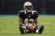 CHARLOTTE, NC - SEPTEMBER 16: Darren Sproles #43 of the New Orleans Saints sits on the field after a play during their game against the Carolina Panthers at Bank of America Stadium on September 16, 2012 in Charlotte, North Carolina. (Photo by Streeter Lecka/Getty Images)