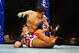 Dec 30, 2011; Las Vegas, NV, USA; UFC fighter Nam Phan (bottom) fights against Jimy Hettes (top) during a featherweight bout at UFC 141 at the MGM Grand Garden event center. Mandatory Credit: Mark J. Rebilas-US PRESSWIRE