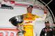 FONTANA, CA - SEPTEMBER 15: Ryan Hunter-Reay driver of the #28 Andretti Autosport Dallara Chevrolet poses with the Astor Cup as team owner Michael Andretti stands behind after winning the IZOD IndyCar Series Championship after finishing fourth in the IZOD IndyCar Series MAVTV 500 World Championship race at the Auto Club Speedway on September 15, 2012 in Fontana, California. (Photo by Robert Laberge/Getty Images)