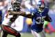 EAST RUTHERFORD, NJ - SEPTEMBER 16: Andre Brown #35 of the New York Giants holds off Mark Barron #24 of the Tampa Bay Buccaneers during a game at MetLife Stadium on September 16, 2012 in East Rutherford, New Jersey. (Photo by Jeff Zelevansky/Getty Images)
