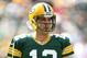 GREEN BAY, WI - SEPTEMBER 09: Aaron Rodgers #12 of the Green Bay Packers warms up before the NFL season opener against the San Francisco 49ers at Lambeau Field on September 9, 2012 in Green Bay, Wisconsin. (Photo by Andy Lyons/Getty Images)