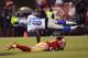 SAN FRANCISCO, CA - SEPTEMBER 16: Calvin Johnson #81 of the Detroit Lions after a twenty six yard pass play, has his legs cut from under him by Dashon Goldson #38 of the San Francisco 49ers during the fourth quarter of an NFL football game at Candlestick Park on September 16, 2012 in San Francisco, California. (Photo by Thearon W. Henderson/Getty Images)