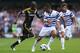 LONDON, ENGLAND - SEPTEMBER 15: Ramires of Chelsea takes on the QPR defence during the Barclays Premier League match between Queens Park Rangers and Chelsea at Loftus Road on September 15, 2012 in London, England. (Photo by Julian Finney/Getty Images)