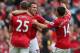 MANCHESTER, ENGLAND - SEPTEMBER 15: Nick Powell of Manchester United celebrates with Robin van Persie and Javier Hernandez after scoring the fourth goal during the Barclays Premier League match between Manchester United and Wigan Athletic at Old Trafford on September 15, 2012 in Manchester, England. (Photo by Alex Livesey/Getty Images)