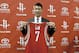 HOUSTON, TX - JULY 19: Jeremy Lin of the Houston Rockets displays his jersey during a press conference at Toyota Center on July 19, 2012 in Houston, Texas. (Photo by Bob Levey/Getty Images)