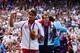 LONDON, ENGLAND - AUGUST 05: Silver medalist Roger Federer (L) of Switzerland, gold medalist Andy Murray (R) of Great Britain celebrate during the medal ceremony for the Men's Singles Tennis match on Day 9 of the London 2012 Olympic Games at the All England Lawn Tennis and Croquet Club on August 5, 2012 in London, England. Murray defeated Federer in the gold medal match in straight sets 2-6, 1-6, 4-6. (Photo by Clive Brunskill/Getty Images)