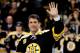 BOSTON - FEBRUARY 13: Former Boston Bruins player Cam Neely acknowledges the crowd during the ceremony honoring John Bucyk for his 50 years with the Bruins organization before the game against the Edmonton Oilers on February 13, 2007 at TD Banknorth Garden in Boston, Massachusetts. The Bruins won 3-0. (Photo by Elsa/Getty Images)