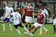 MILAN, ITALY - SEPTEMBER 18: Nigel De Jong of AC Milan and Lucas Biglia #5 of RSC Anderlecht compete for the ball during the UEFA Champions League group C match at Stadio Giuseppe Meazza on September 18, 2012 in Milan, Italy. (Photo by Claudio Villa/Getty Images)